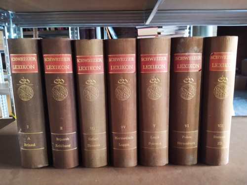 Portada del libro de SCHWEIZER LEXIKON in sieben Bänden / SWISS LEXICON in seven volumes