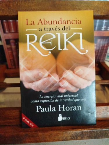 Portada del libro de La abundancia a través del Reiki